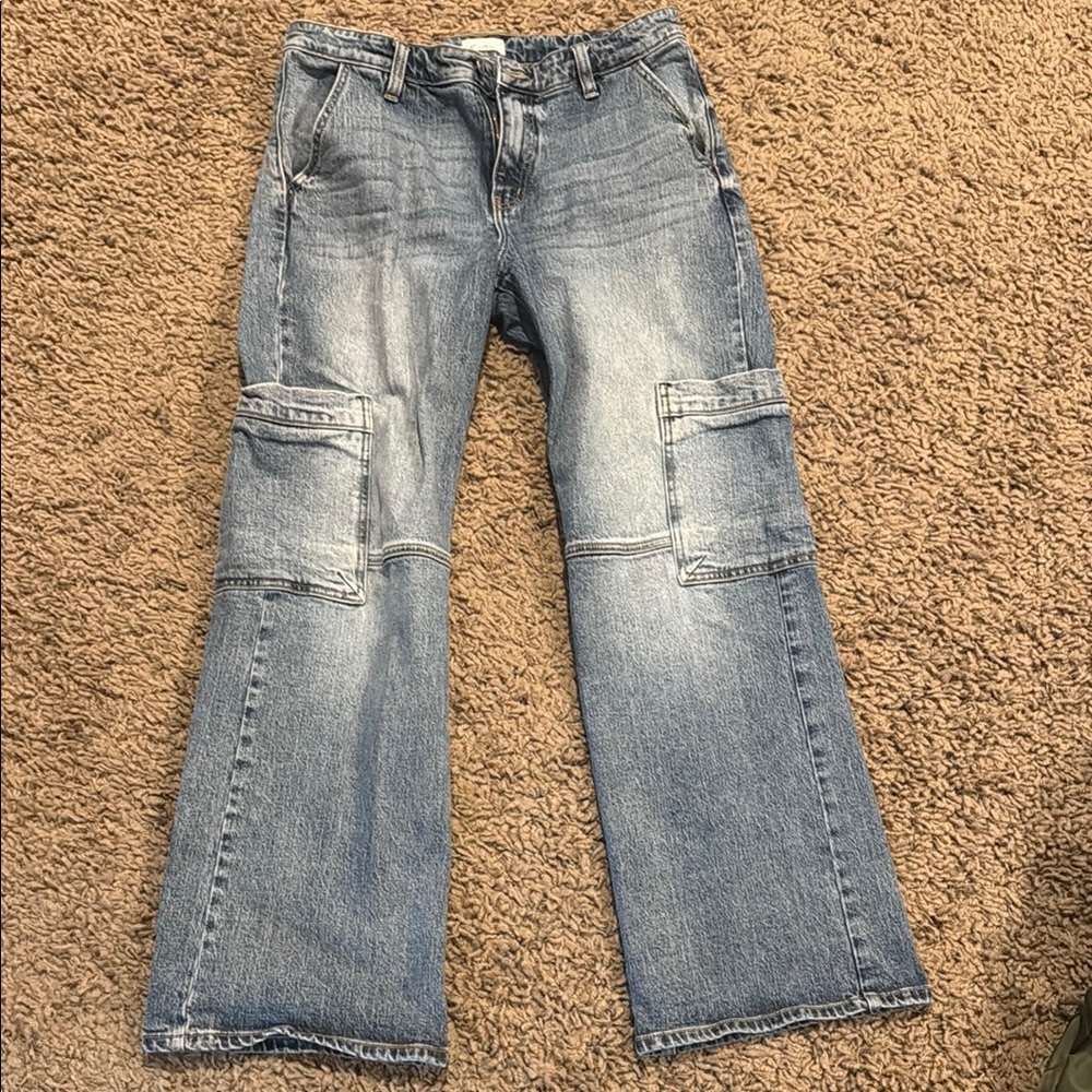 Size 9 KanCan Blue Flare Wide Leg Jeans with Distressed Details, like new.